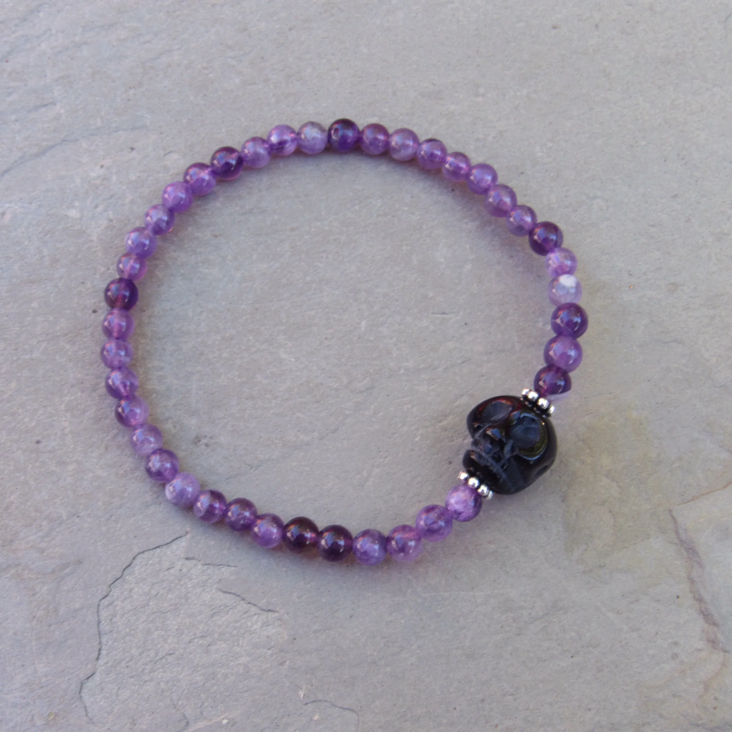 Amethyst gemstone, Onyx Skull, and Sterling Silver Women’s Stertch Bracelet