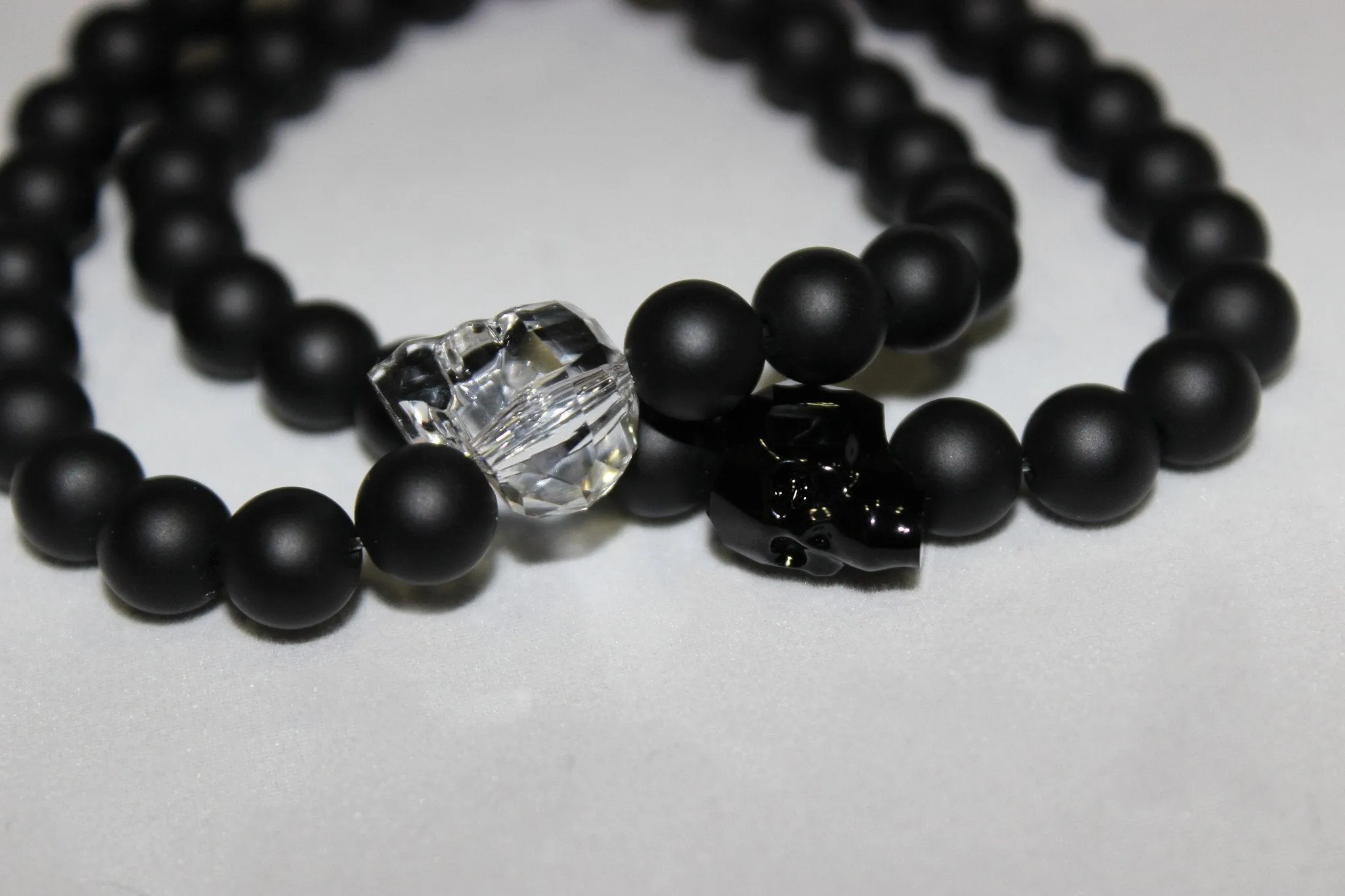 Black Onyx Bead Bracelet with Swarovski Crystal Skulls- UDINC0440