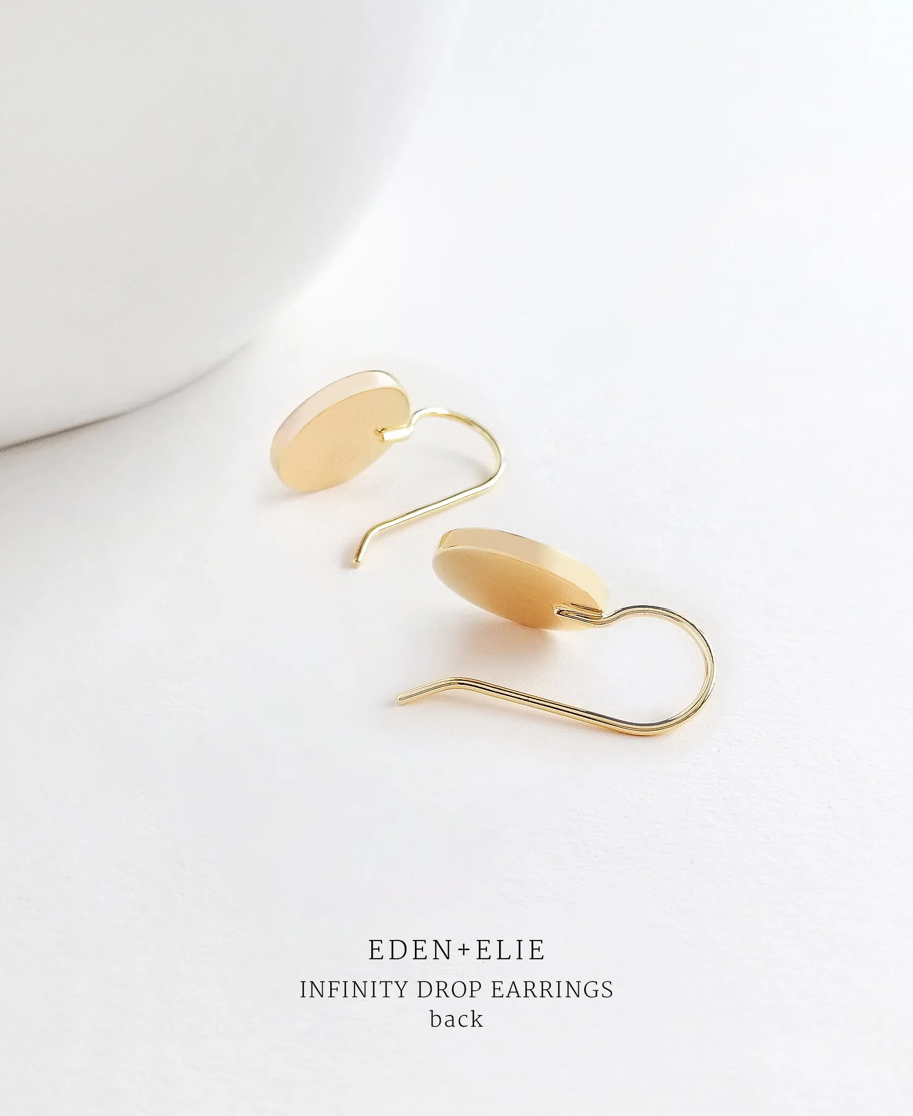 EDEN   ELIE Infinity drop earrings - nectar